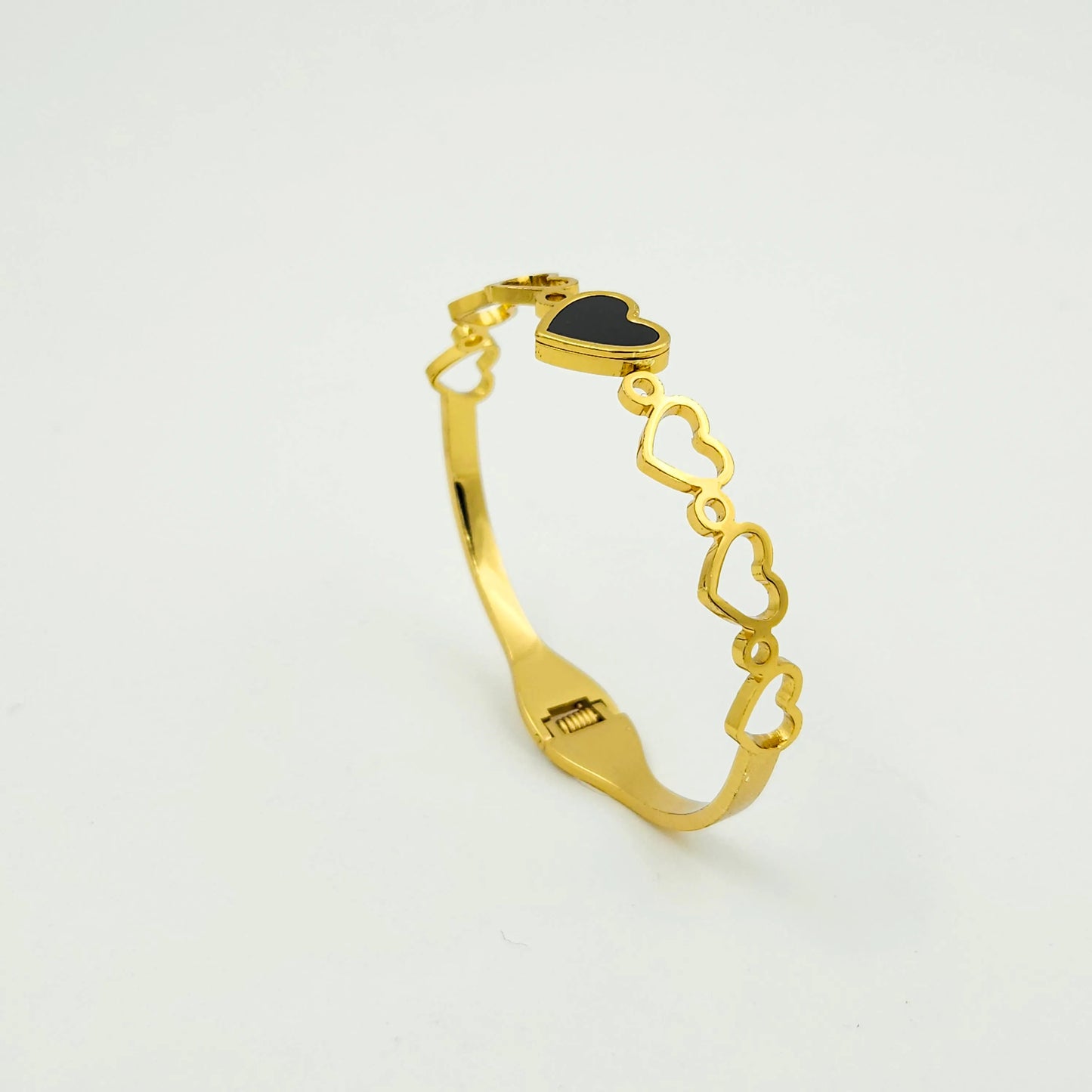 Heart in black bangle bracelet
