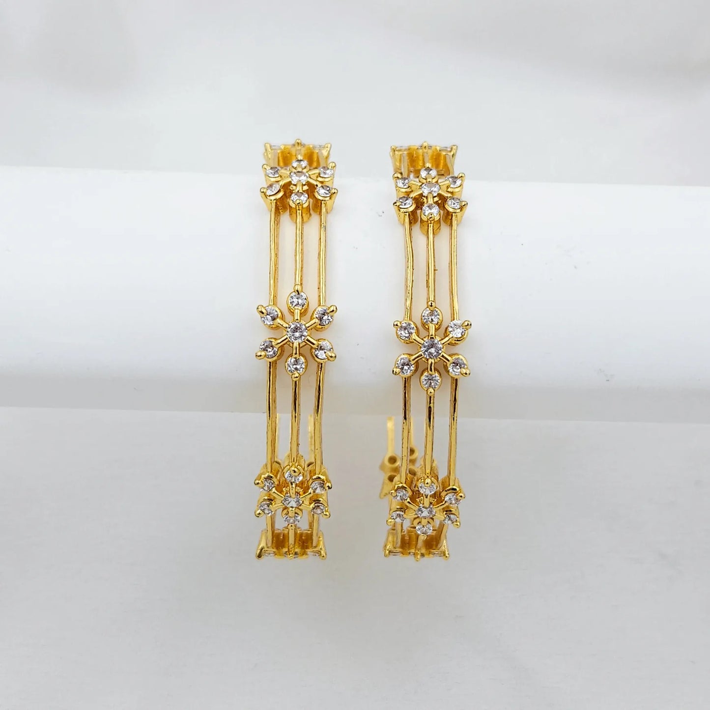 Triple layer diamond studded floral bangles - set of 2