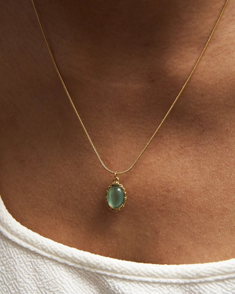 BLUISH GREEN OVAL SHINY STONE PENDANT - TARNISH FREE GOLD PLATED