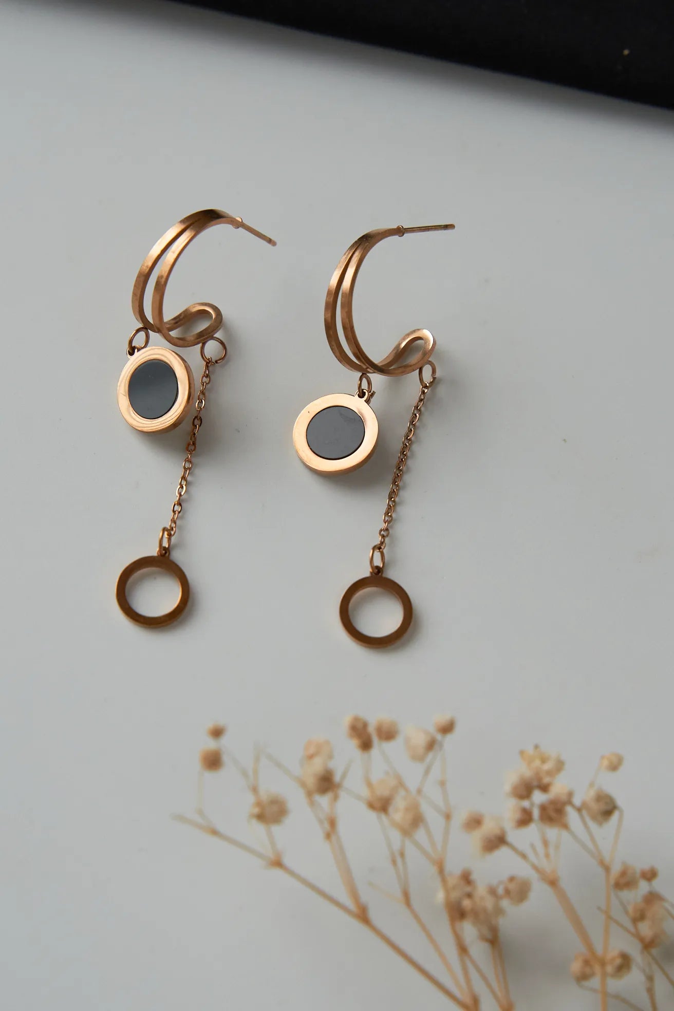 Rose gold black ring pattern with round drop