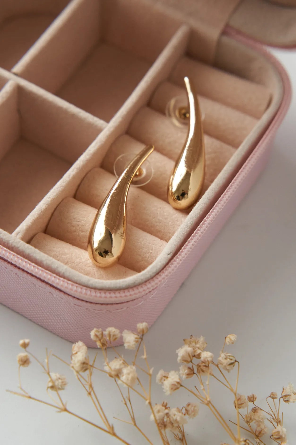 Long drop gold plated statement earrings