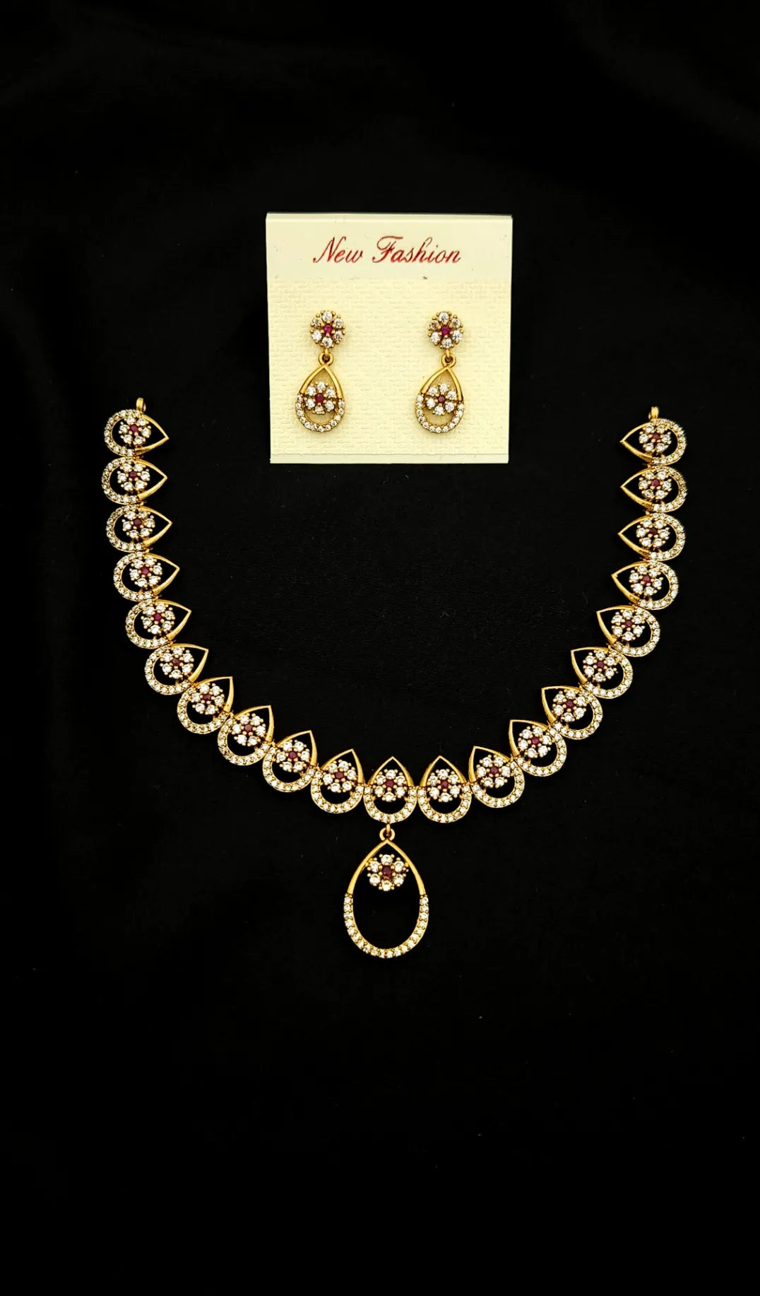 Stylish Gold Stone Studded Drop Necklace with Earrings
