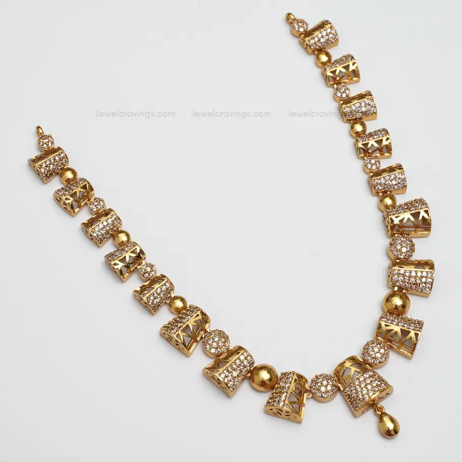 Gold Sheen American Diamond Necklace with Earrings