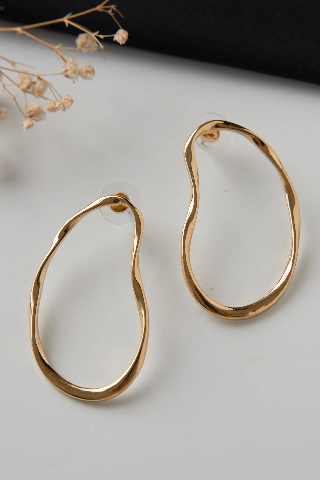 Girls pear shaped gold plated earrings