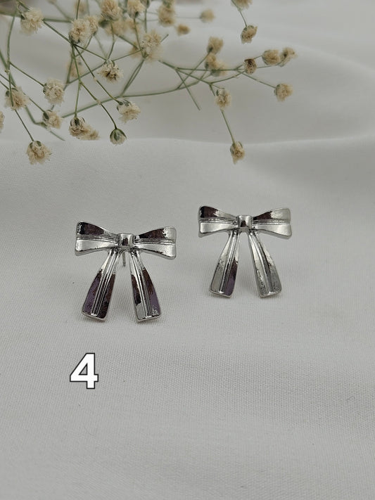 Silver bow pretty earrings